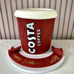 Costa coffee cup themed birthday cake designed as a realistic red takeaway coffee cup