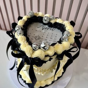 Vintage heart burn away cake with Lambeth piping and hidden photo reveal by Sweet Story cake studio