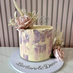 Diamond Wedding Anniversary cake with textured blush and lilac buttercream, silver leaf and floral decorations