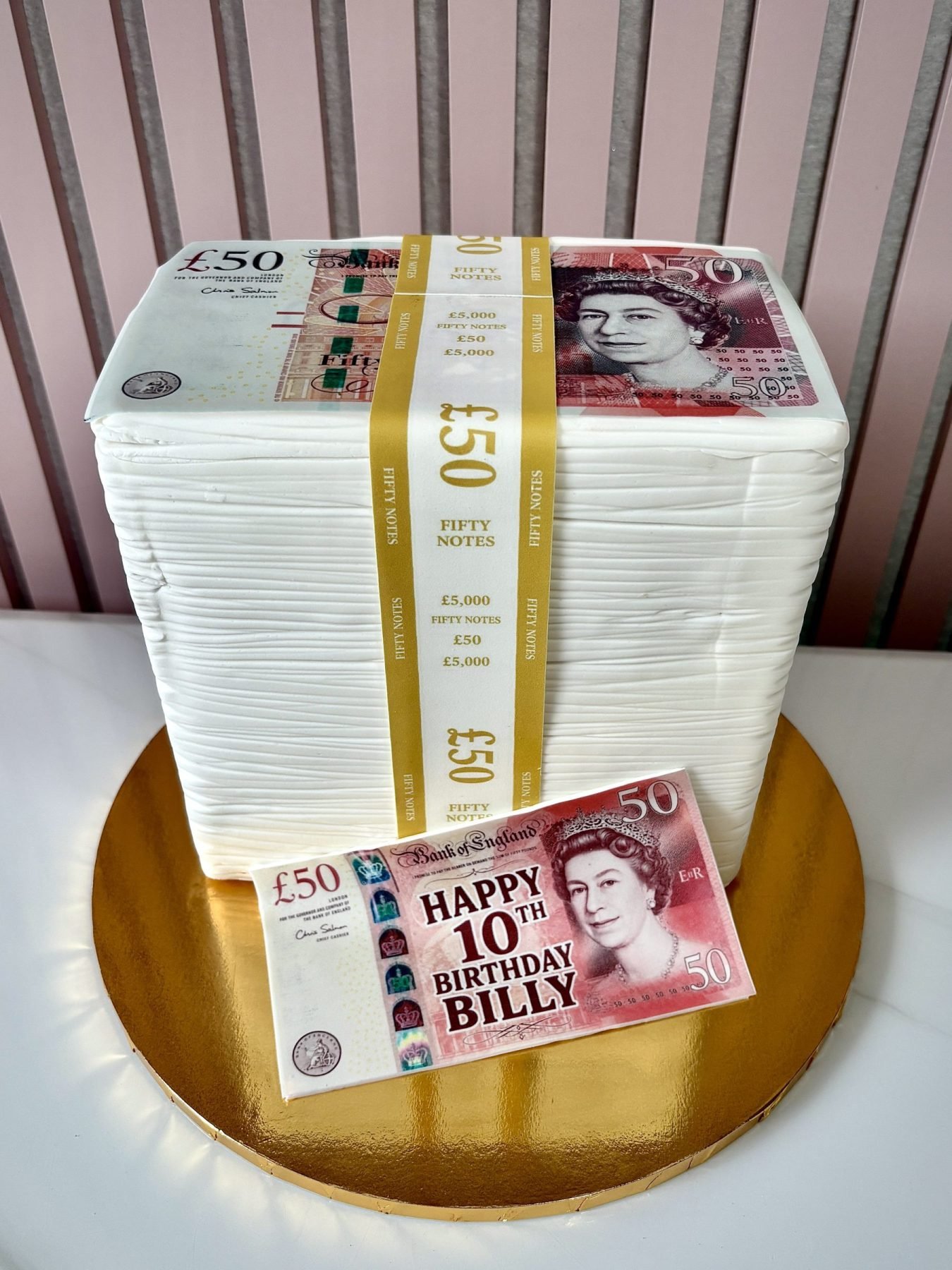 Money stack birthday cake with printed edible bank note details and gold money band design